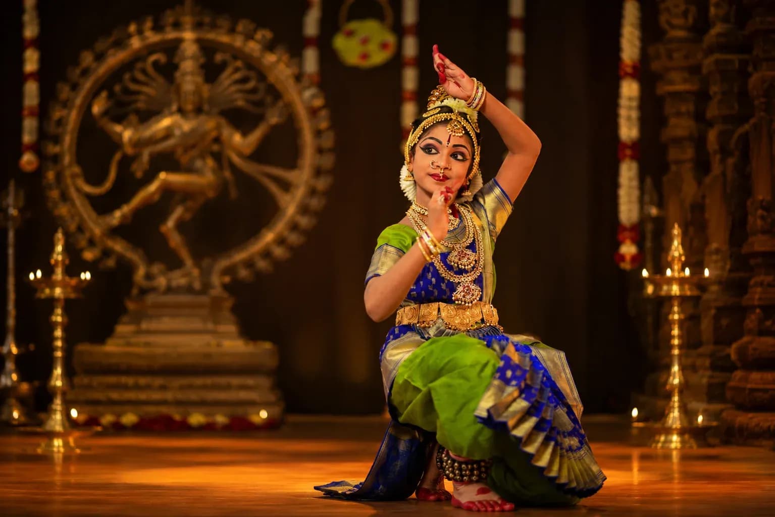 Bharathanatyam dancers in a flowing sequence of poses